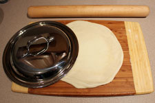 Double up dough one last time and roll to the size of your pan